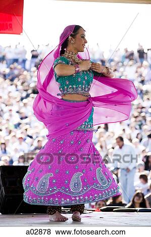 USA, Utah, Spanish Fork, mid adult dancer in traditional clothing performing on stage View Large Photo Image Stock Photo - USA, Utah, Spanish Fork, mid adult dancer in traditional clothing performing on stage. Fotosearch