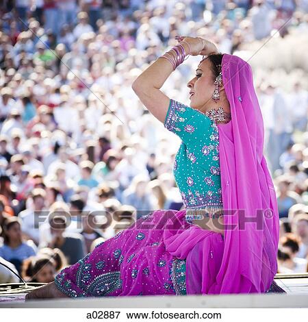 USA, Utah, Spanish Fork, mid adult dancer in traditional clothing performing on stage View Large Photo Image Stock Photo - USA, Utah, Spanish Fork, mid adult dancer in traditional clothing performing on stage. Fotosearch