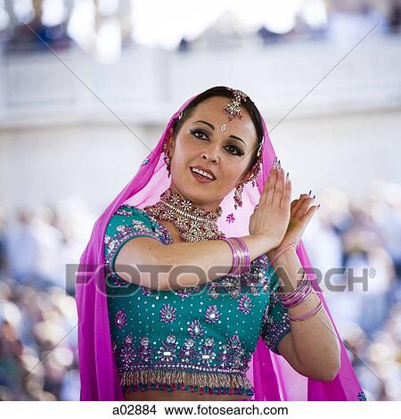 USA, Utah, Spanish Fork, portrait of mid adult dancer in traditional clothing performing on stage View Large Photo Image Picture - USA, Utah, Spanish Fork, portrait of mid adult dancer in traditional clothing performing on stage. Fotosearch