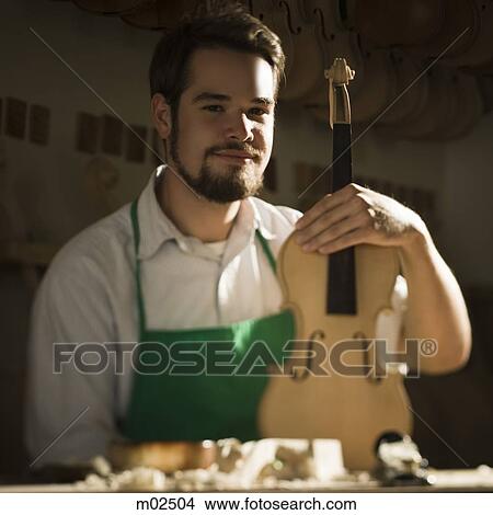 violin maker in the workshop View Large Photo Image Picture - violin maker in the workshop. Fotosearch