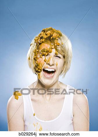 woman getting food dumped on her head View Large Photo Image Stock Image - woman getting food dumped on her head. Fotosearch