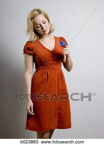 woman holding a butterfly View Large Photo Image Stock Image - woman holding a butterfly. Fotosearch
