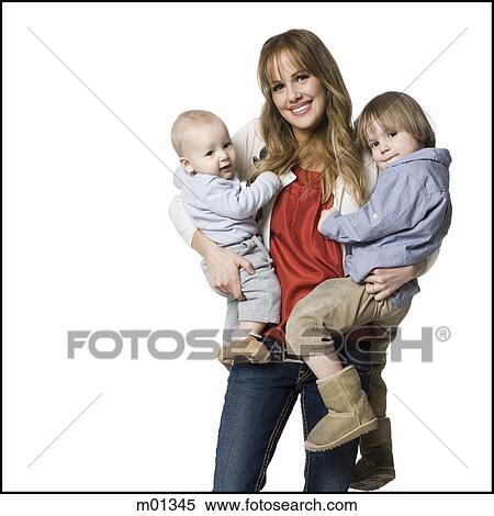 Stock Photography - woman holding two children. Fotosearch