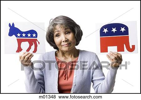 Stock Photo - woman holding up political party signs. Fotosearch