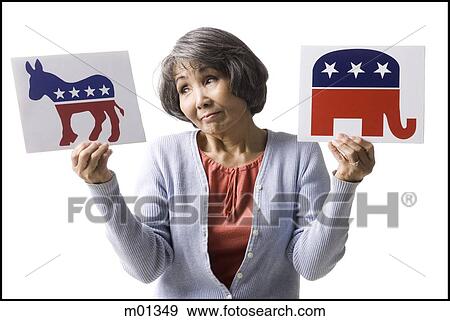 woman holding up political party signs View Large Photo Image Stock Photo - woman holding up political party signs. Fotosearch