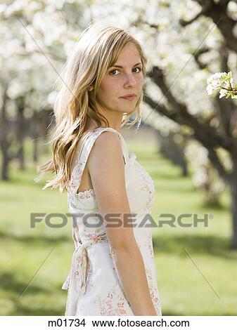 woman in a white dress View Large Photo Image Picture - woman in a white dress. Fotosearch