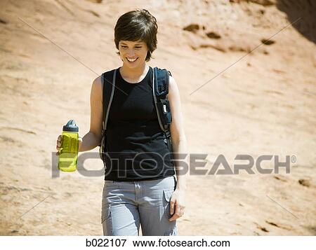Stock Photo - woman in the desert. Fotosearch