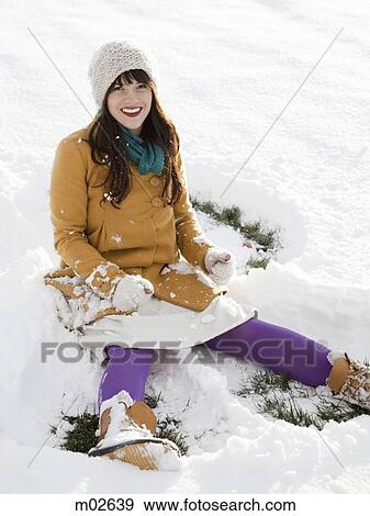 woman making a snow angel View Large Photo Image Stock Photo - woman making a snow angel. Fotosearch