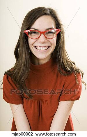 woman smiling wearing horn rimmed glasses View Large Photo Image Stock Image - woman smiling wearing horn rimmed glasses. Fotosearch
