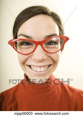 woman smiling wearing horn rimmed glasses View Large Photo Image Stock Image - woman smiling wearing horn rimmed glasses. Fotosearch