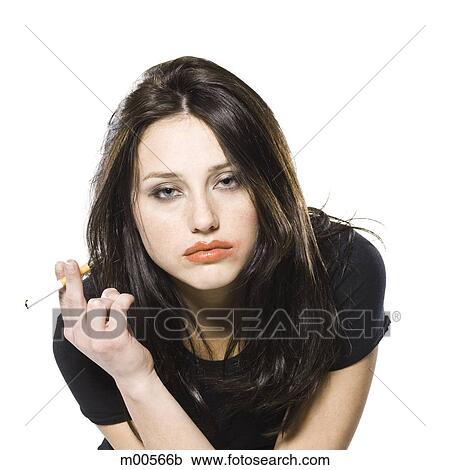 Stock Image - woman smoking a cigarette. Fotosearch