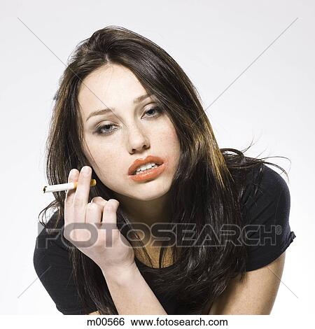 woman smoking a cigarette View Large Photo Image Stock Photograph - woman smoking a cigarette. Fotosearch
