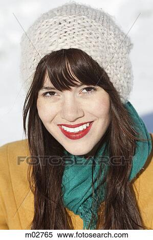 Stock Photography - woman standing in the snow. Fotosearch