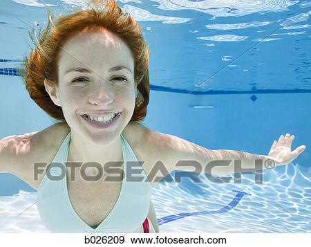 Stock Photo - woman underwater. Fotosearch