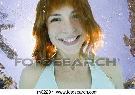 Stock Photo - woman underwater. Fotosearch