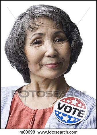 woman with a "vote" button View Large Photo Image Stock Photo - woman with a "vote" button. Fotosearch
