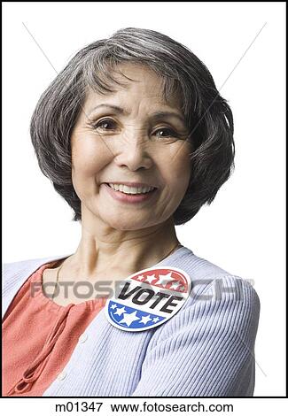woman with a "vote" button View Large Photo Image Stock Photo - woman with a "vote" button. Fotosearch
