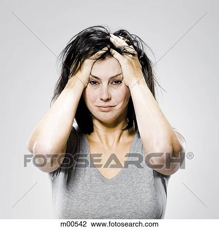 woman with her hands on her head View Large Photo Image Stock Image - woman with her hands on her head. Fotosearch