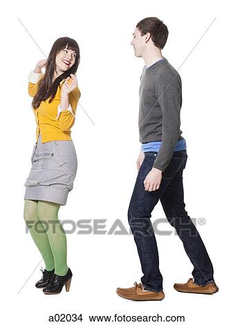 Young couple dancing, studio shot View Large Photo Image Picture - Young couple dancing, studio shot. Fotosearch