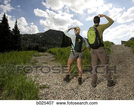 young couple on a hiking trip View Large Photo Image Stock Photo - young couple on a hiking trip. Fotosearch