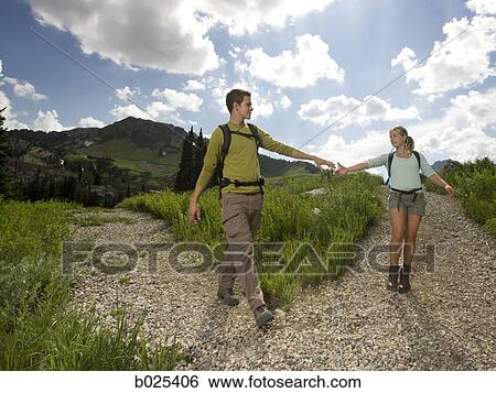 young couple on a hiking trip View Large Photo Image Stock Photograph - young couple on a hiking trip. Fotosearch