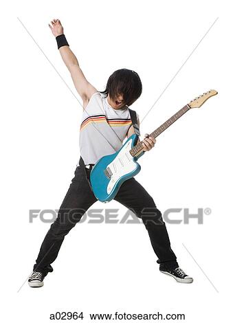 Picture - Young man playing electric guitar. Fotosearch