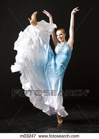 Stock Photo - Young woman ballroom dancing. Fotosearch