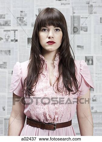 Young woman in retro dress, portrait View Large Photo Image Stock Photo - Young woman in retro dress, portrait. Fotosearch