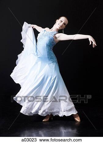 Young woman posing as professional dancer, studio shot View Large Photo Image Stock Image - Young woman posing as professional dancer, studio shot. Fotosearch