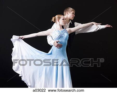Young woman posing with teenage boy (16-17) as two professional dancers, studio shot View Large Photo Image Stock Image - Young woman posing with teenage boy (16-17) as two professional dancers, studio shot. Fotosearch