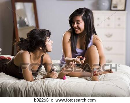 young women doing their nails View Large Photo Image Stock Image - young women doing their nails. Fotosearch