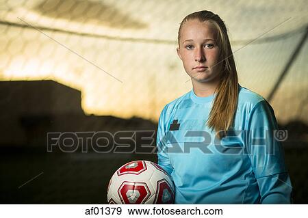 Close up portrait of serious athlete under sunset sky View Large Photo Image Stock Photo - Close up portrait of serious athlete under sunset sky. Fotosearch
