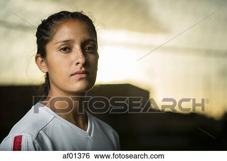 Close up portrait of serious athlete under sunset sky View Large Photo Image Stock Photograph - Close up portrait of serious athlete under sunset sky. Fotosearch
