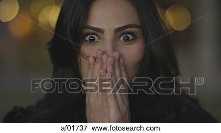 Close up portrait of surprised woman gasping and covering mouth with hands View Large Photo Image Stock Photo - Close up portrait of surprised woman gasping and covering mouth with hands. Fotosearch