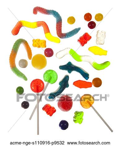 Stock Image - Colorful sweets on white background forming abstract pattern. Fotosearch