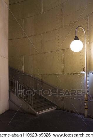 Stock Photograph - France, Paris, Staircase with lamp. Fotosearch