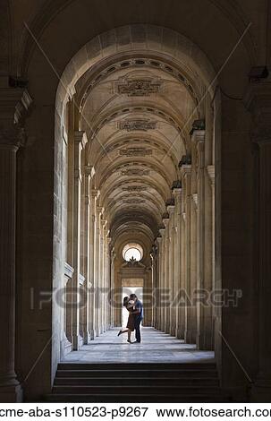 France, Paris, Young couple kissing on hallway in Louvre Museum View Large Photo Image Stock Photo - France, Paris, Young couple kissing on hallway in Louvre Museum. Fotosearch