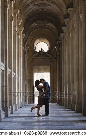 France, Paris, Young couple kissing on hallway in Louvre Museum View Large Photo Image Stock Photo - France, Paris, Young couple kissing on hallway in Louvre Museum. Fotosearch