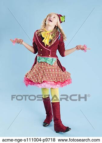 Girl (10-11) in Mad Hatter costume for Halloween View Large Photo Image Stock Photo - Girl (10-11) in Mad Hatter costume for Halloween. Fotosearch