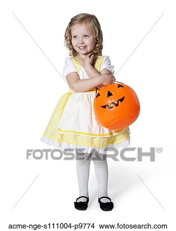 Girl (2-3) in Goldilocks costume with pumpkin lantern for Halloween View Large Photo Image Picture - Girl (2-3) in Goldilocks costume with pumpkin lantern for Halloween. Fotosearch
