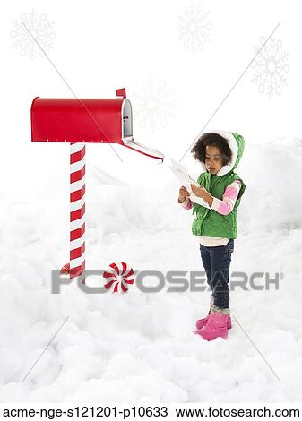 Girl (4-5) sending letter to Santa View Large Photo Image Stock Image - Girl (4-5) sending letter to Santa. Fotosearch