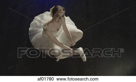 Overhead portrait of smiling ballet dancer wearing costume View Large Photo Image Stock Image - Overhead portrait of smiling ballet dancer wearing costume. Fotosearch
