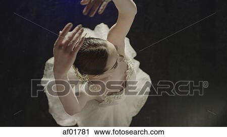 Overhead view of serious ballet dancer dancing in costume View Large Photo Image Stock Image - Overhead view of serious ballet dancer dancing in costume. Fotosearch
