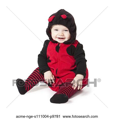 Portrait of baby girl (6-11 months) in ladybird costume for Halloween View Large Photo Image Stock Image - Portrait of baby girl (6-11 months) in ladybird costume for Halloween. Fotosearch