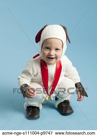 Portrait of boy (12-17 months) in lamb costume for Halloween View Large Photo Image Stock Photo - Portrait of boy (12-17 months) in lamb costume for Halloween. Fotosearch