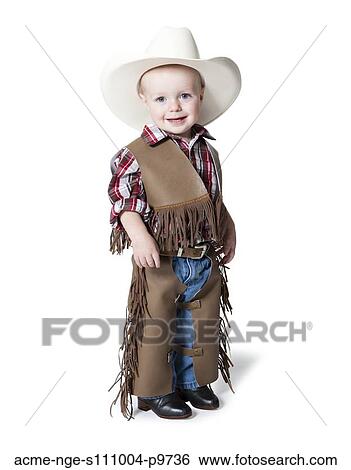 Portrait of boy (12-17 months) in cowboy costume for Halloween View Large Photo Image Stock Photograph - Portrait of boy (12-17 months) in cowboy costume for Halloween. Fotosearch