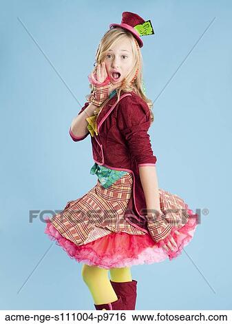 Portrait of girl (10-11) in Mad Hatter costume for Halloween View Large Photo Image Stock Photograph - Portrait of girl (10-11) in Mad Hatter costume for Halloween. Fotosearch