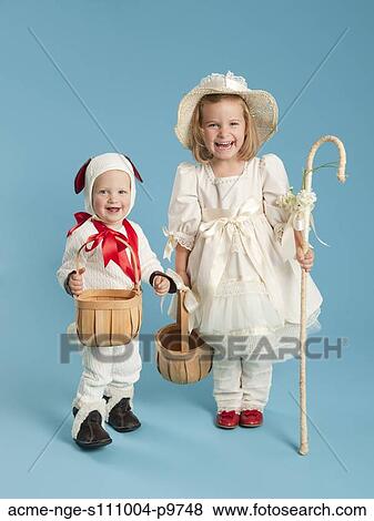 Portrait of girl (2-3) as Little Bo Peep with boy (12-17 months) as lamb for Halloween View Large Photo Image Stock Photo - Portrait of girl (2-3) as Little Bo Peep with boy (12-17 months) as lamb for Halloween. Fotosearch