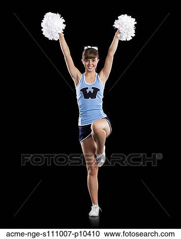 Portrait of teenage cheerleader girl (16-17) holding pom-poms View Large Photo Image Stock Image - Portrait of teenage cheerleader girl (16-17) holding pom-poms. Fotosearch