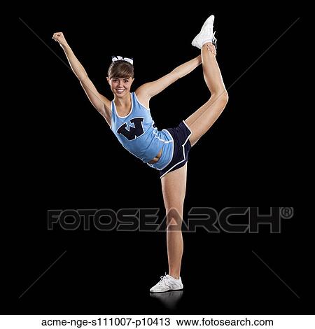 Portrait of teenage cheerleader girl (16-17) stretching View Large Photo Image Stock Image - Portrait of teenage cheerleader girl (16-17) stretching. Fotosearch